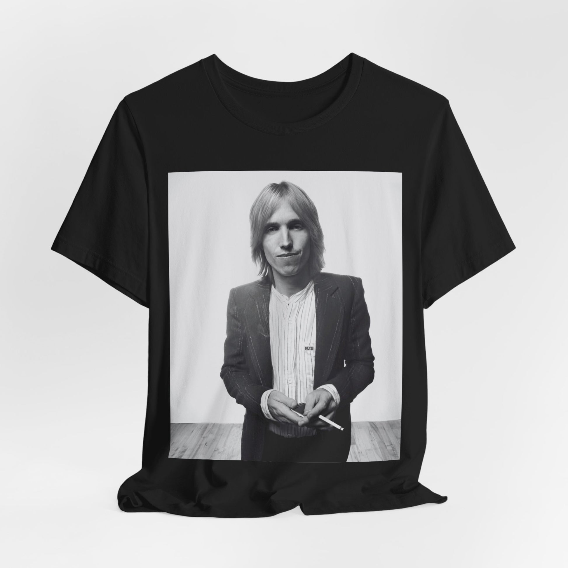 A black graphic t-shirt featuring a graphic of Tom Petty with rock legend vibes.