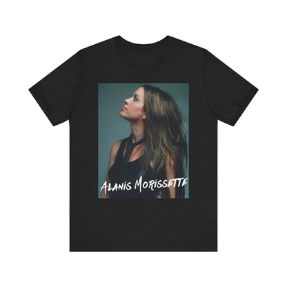 A black graphic t-shirt featuring a retro-style graphic of Alanis Morissette, possibly with her signature or a unique artistic interpretation.