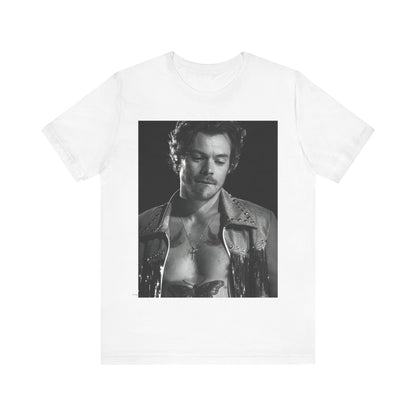A black graphic t-shirt featuring a black and white graphic inspired by Harry Styles' tattoos.