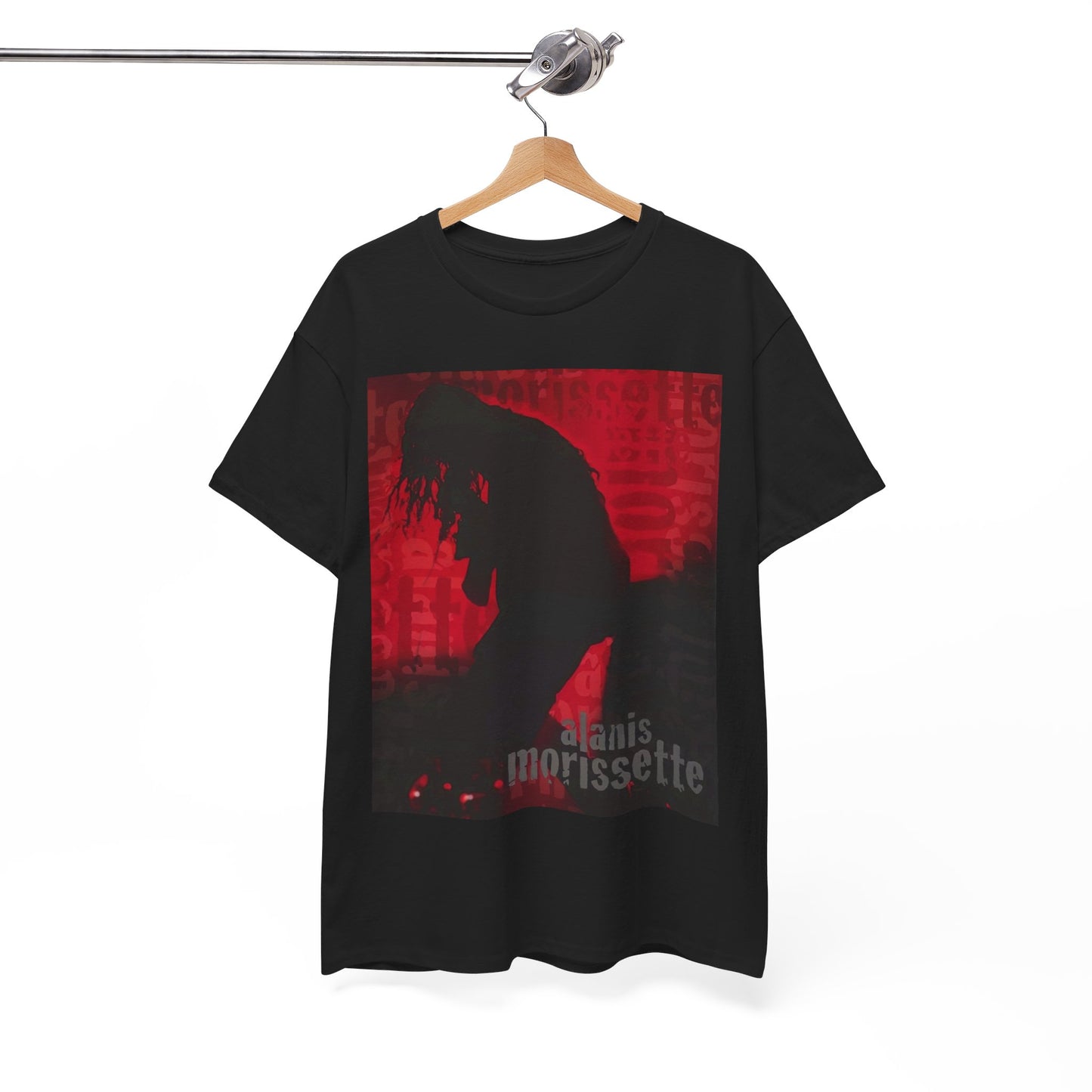A black graphic t-shirt featuring a promotional graphic for an Alanis Morissette tour from the 2000s, possibly with stylized text and band imagery.