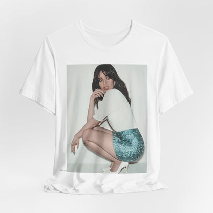 A black graphic t-shirt featuring a stylized graphic of Camila Cabello as a Latin pop princess.