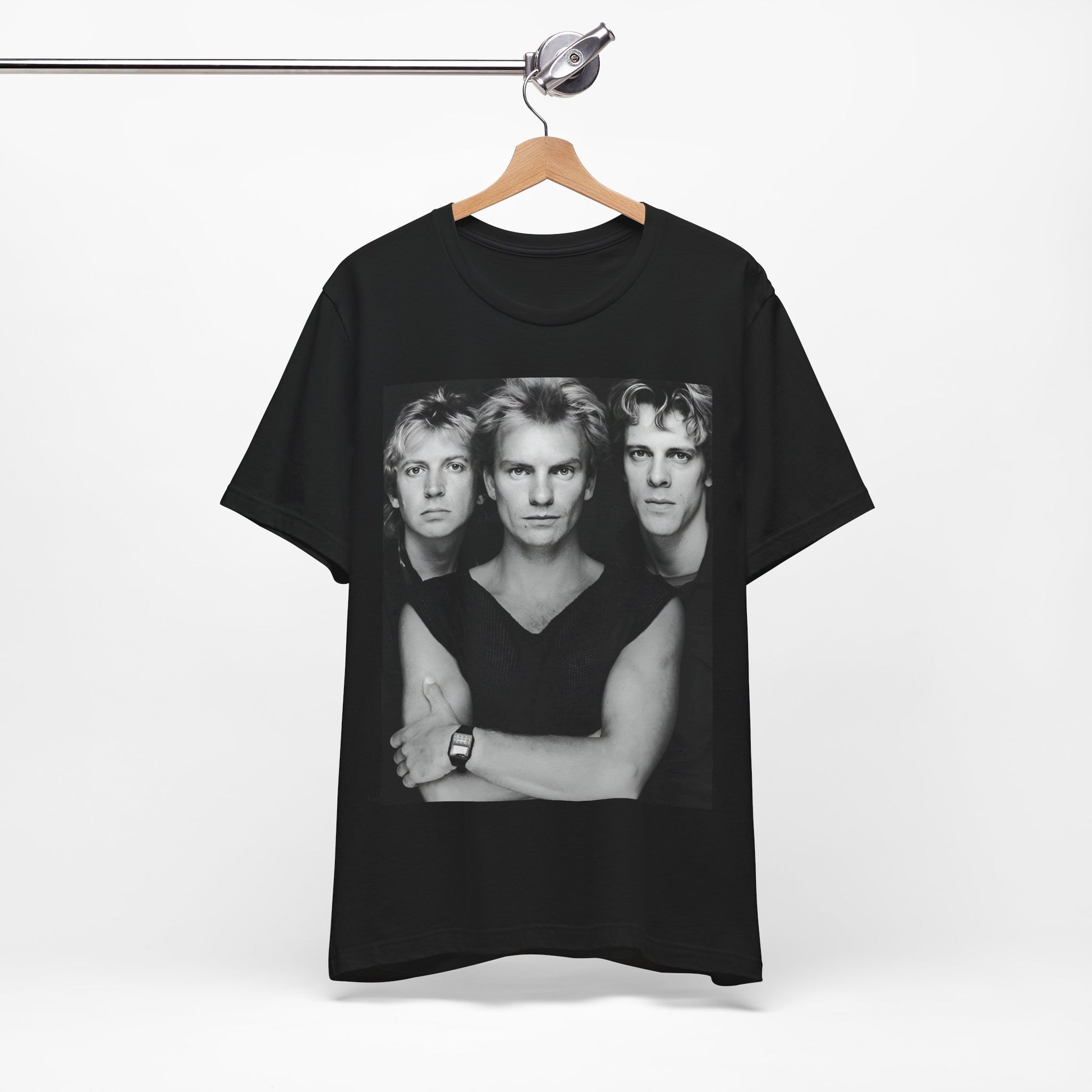 A black graphic t-shirt featuring a graphic related to The Police's 'Every Breath You Take' song or era.