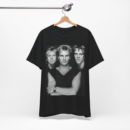 A black graphic t-shirt featuring a graphic related to The Police's 'Every Breath You Take' song or era.