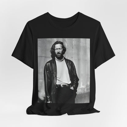 A black graphic t-shirt featuring a retro graphic related to Eric Clapton's 'Cocaine' song or era.
