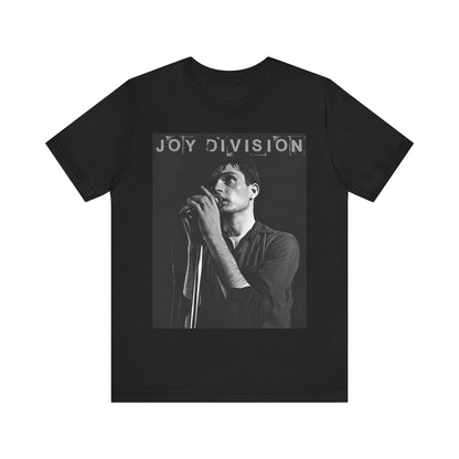 A black graphic t-shirt featuring an 80s goth rock aesthetic graphic of Joy Division.