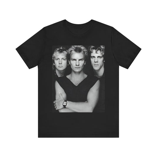 A black graphic t-shirt featuring a graphic related to The Police's 'Every Breath You Take' song or era.