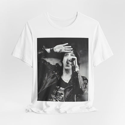 A black graphic t-shirt featuring a black and white portrait photo of The Strokes band.