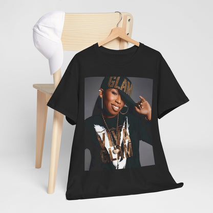 A black graphic t-shirt featuring a 90s graphic of Missy Elliott as a global rap phenomenon.