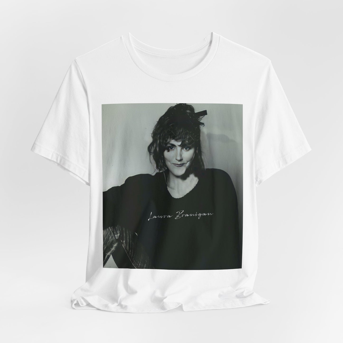 A black graphic t-shirt featuring a casual 80s pop fan graphic of Laura Branigan.