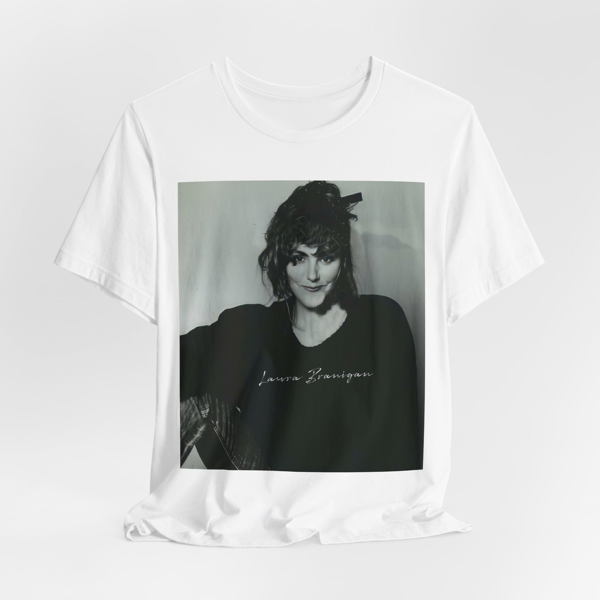 A black graphic t-shirt featuring a casual 80s pop fan graphic of Laura Branigan.