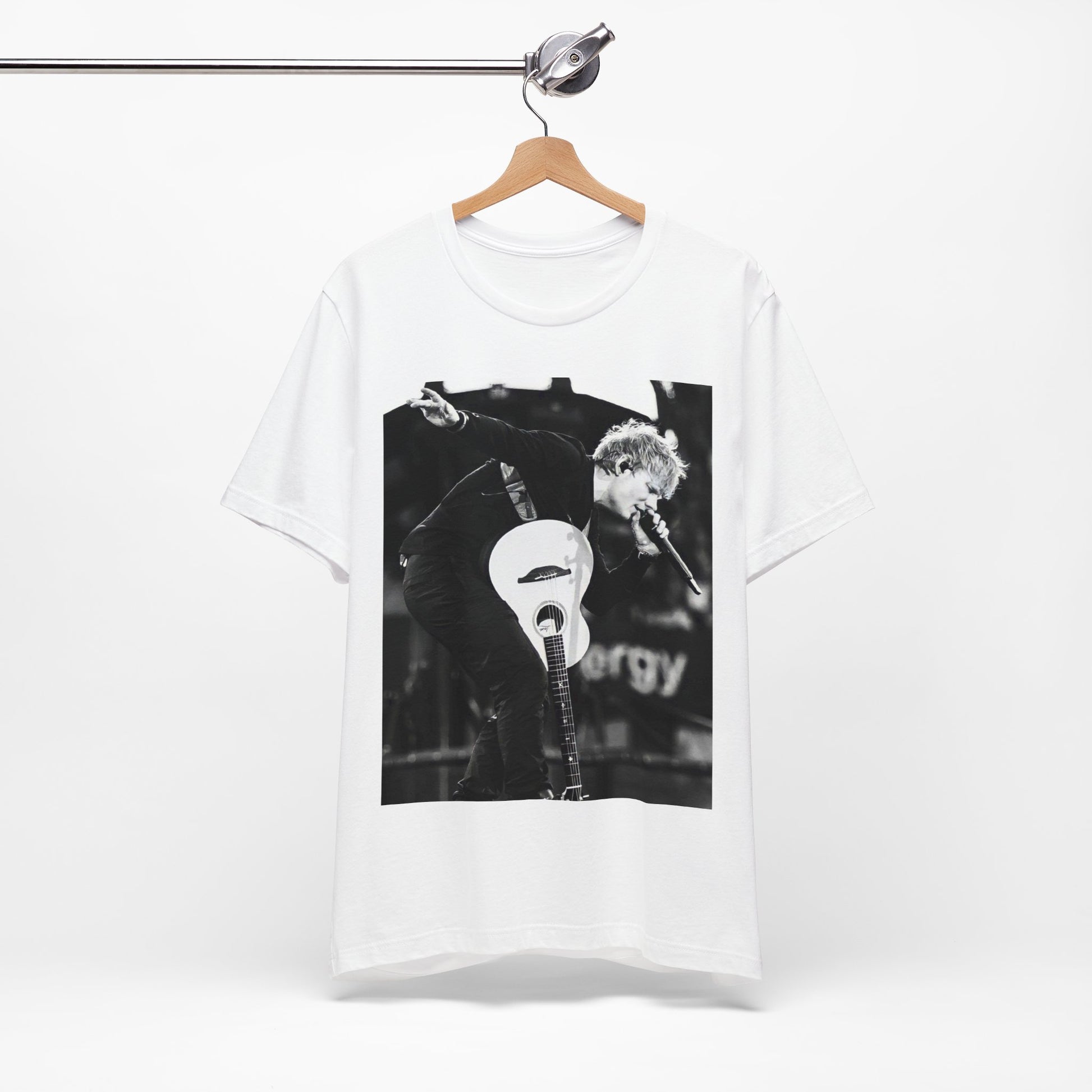 A black graphic t-shirt featuring a vintage graphic of Ed Sheeran performing live.