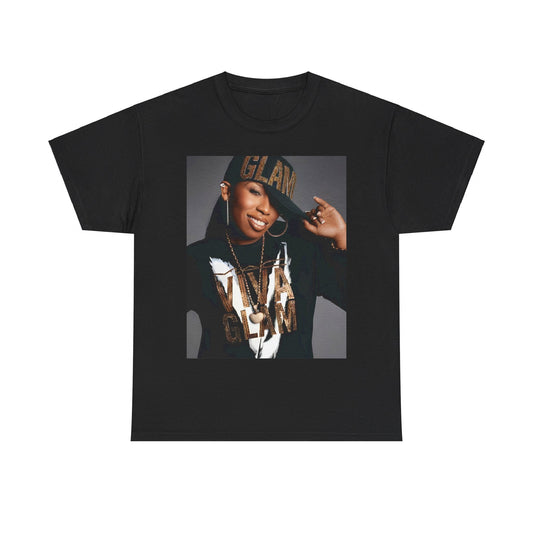 A black graphic t-shirt featuring a 90s graphic of Missy Elliott as a global rap phenomenon.