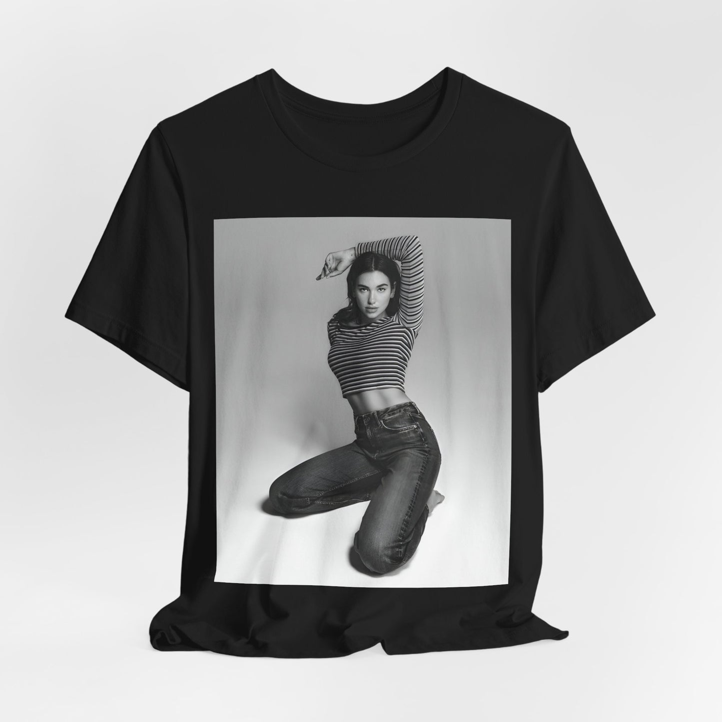A black graphic t-shirt featuring a black and white photo of Dua Lipa in a posed manner.