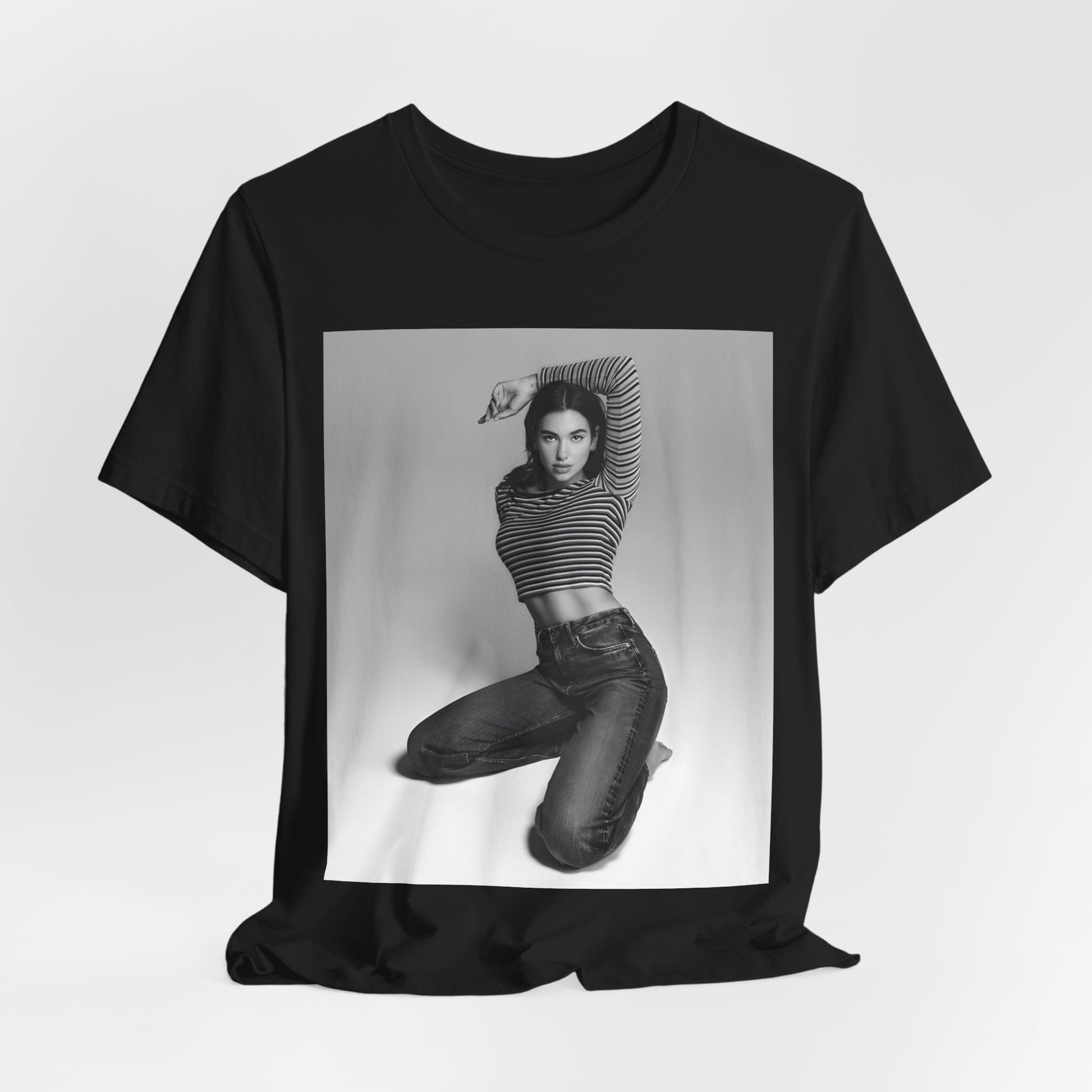 A black graphic t-shirt featuring a black and white photo of Dua Lipa in a posed manner.