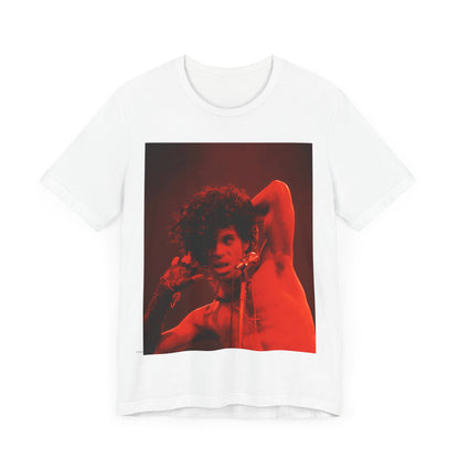 A black graphic t-shirt featuring a concert pop fan graphic of Prince.