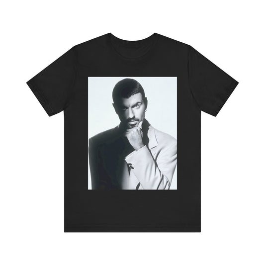 A black graphic t-shirt featuring a 90s aesthetic graphic of George Michael.