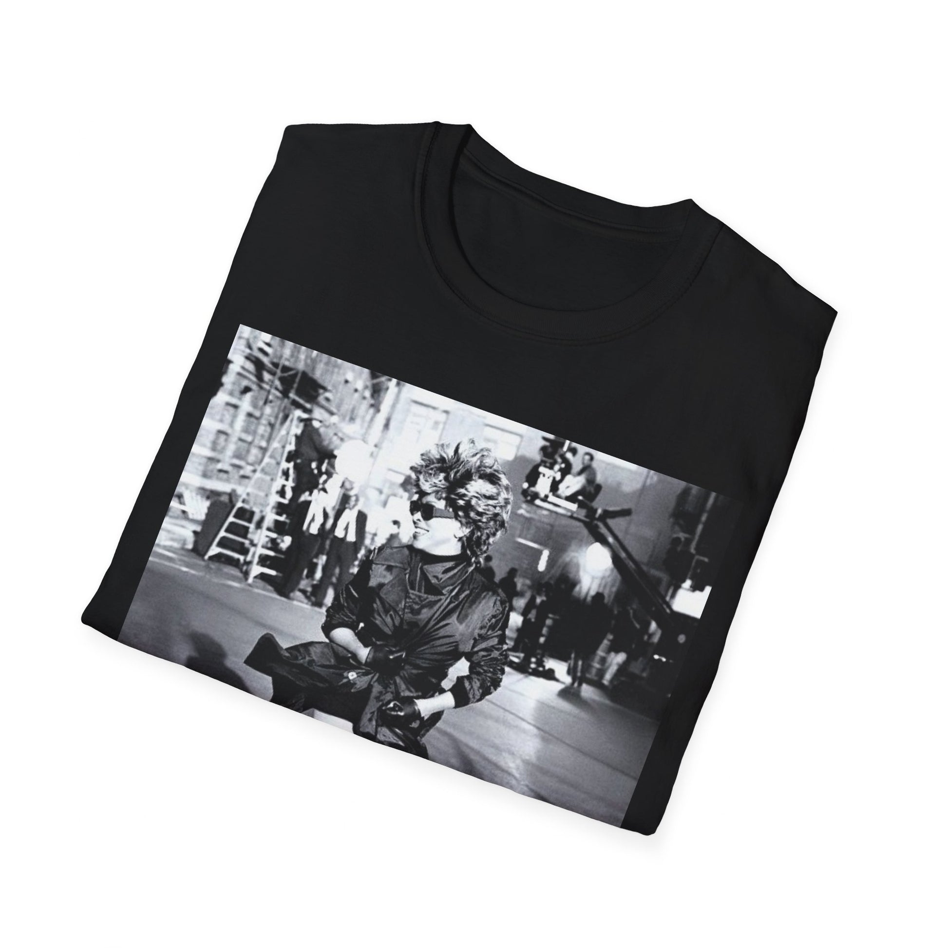 A black graphic t-shirt featuring a black and white graphic related to Tina Turner's 'Simply The Best' era.
