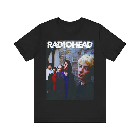 A black graphic t-shirt featuring a 90s graphic related to Radiohead's 'Karma Police' song or era.