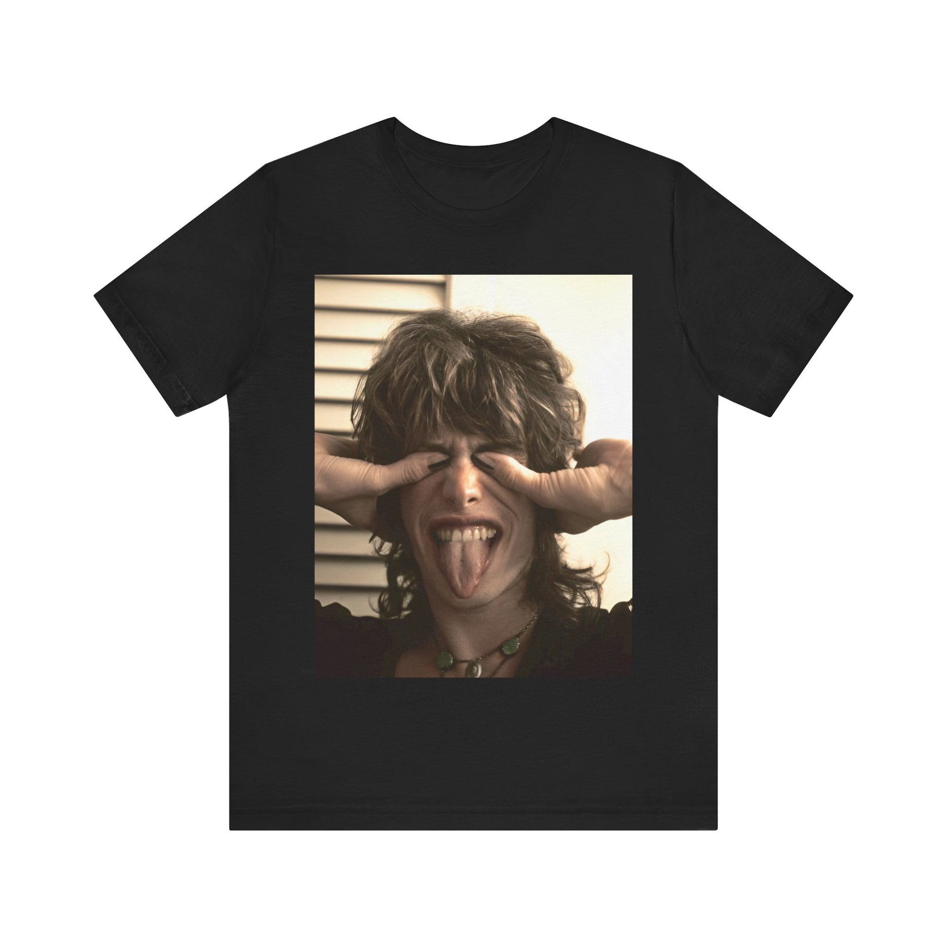A black graphic t-shirt featuring a vintage 70s band photo of Aerosmith, showing the members in their iconic early looks.