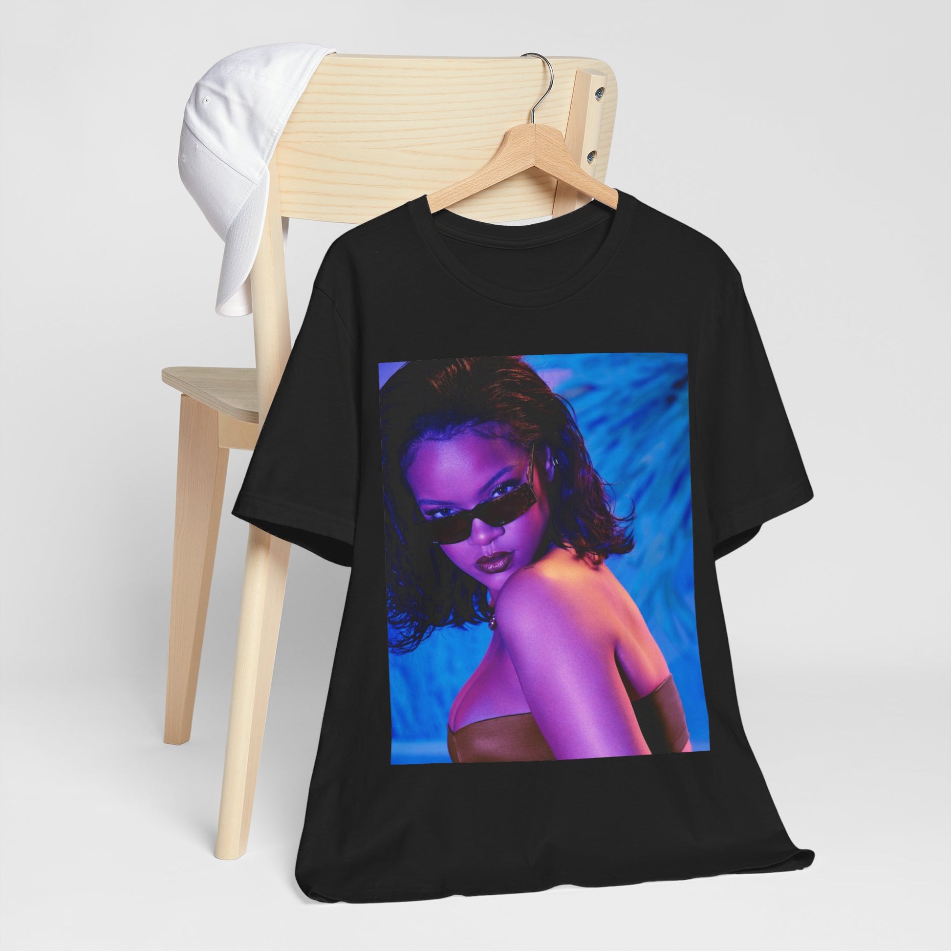 A black graphic t-shirt featuring a retro graphic related to Rihanna's 'Umbrella' song or era.
