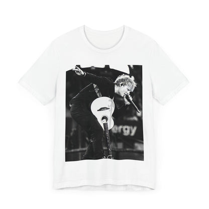 A black graphic t-shirt featuring a vintage graphic of Ed Sheeran performing live.