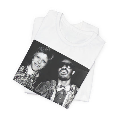 A black graphic t-shirt featuring a retro graphic of Stevie Wonder and David Bowie together.