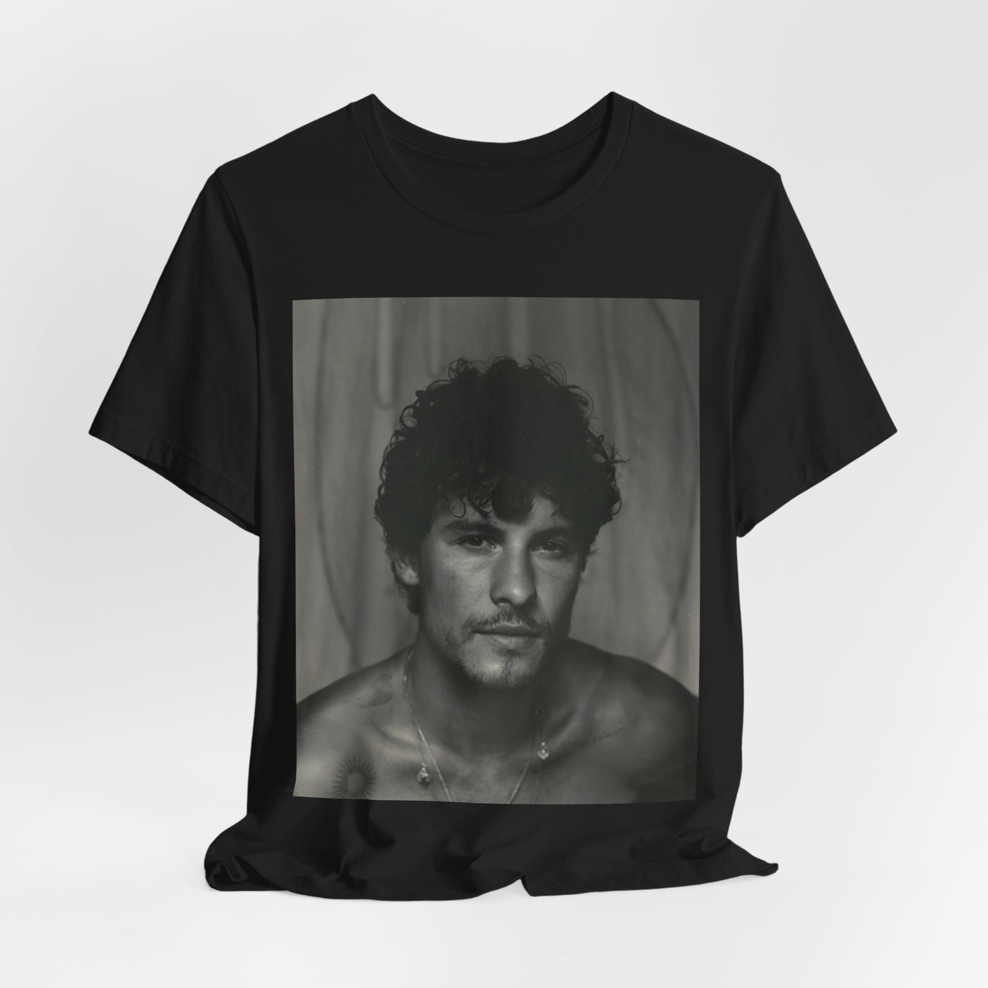 A black graphic t-shirt featuring a fearless portrait graphic of Shawn Mendes.