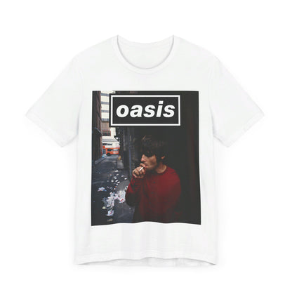 A black graphic t-shirt featuring a classic 90s rock and roll graphic of Oasis.