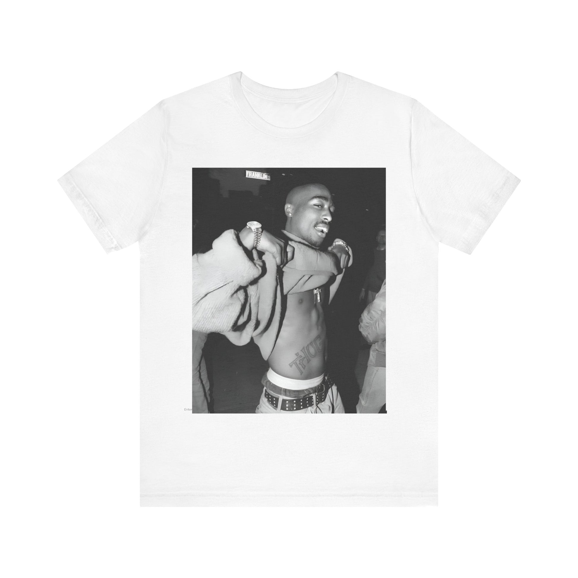 A black graphic t-shirt featuring a vintage hip hop icon graphic of Tupac.