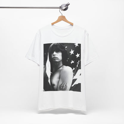 A black graphic t-shirt featuring a retro 70s-style illustration or photo of Aerosmith, integrated with elements of the American flag.