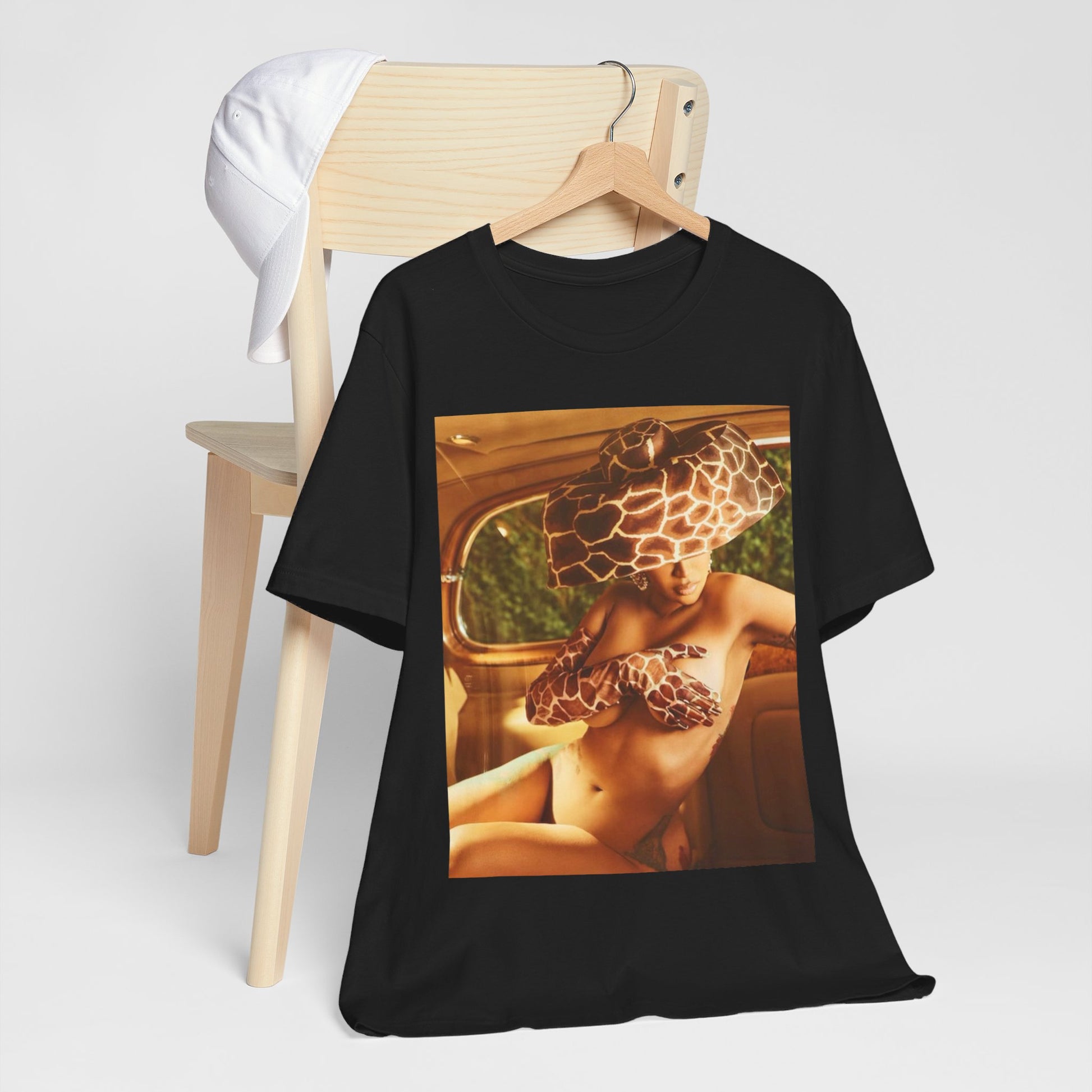 A black graphic t-shirt featuring a graphic of Cardi B as a hip hop culture phenomenon.