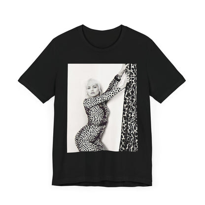 A black graphic t-shirt featuring a black and white, wild-style graphic of Blondie, emphasizing their untamed spirit.