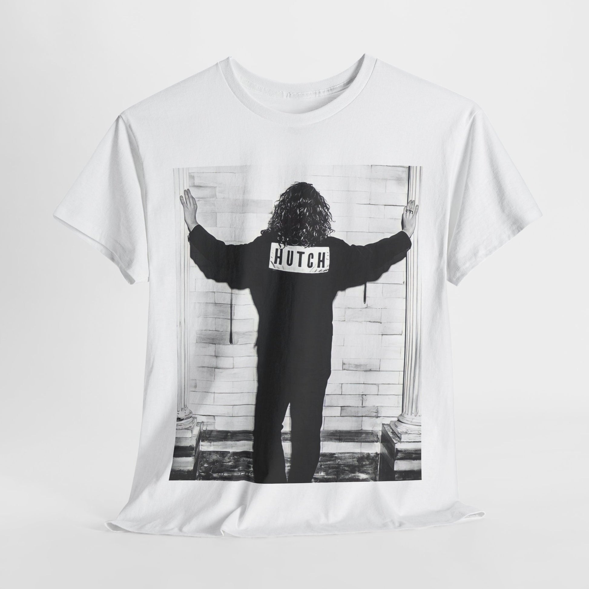 A black graphic t-shirt featuring a graphic of Michael Hutchence from INXS, labeled 'Hutch'.