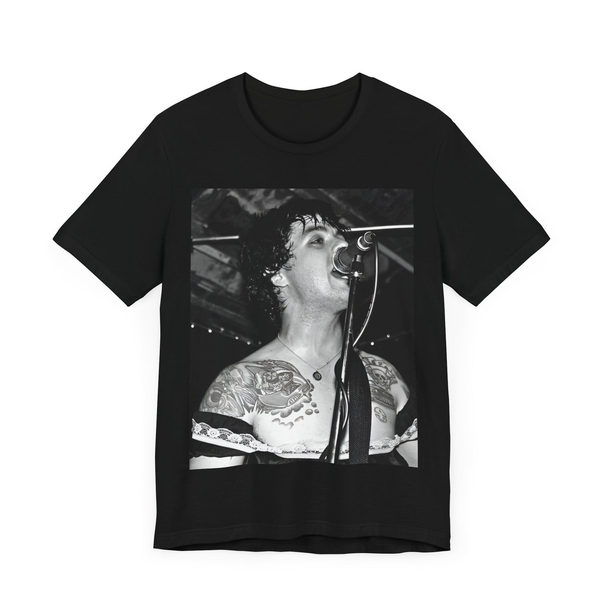 A black graphic t-shirt featuring a black and white graphic or photo of Green Day performing live on stage.