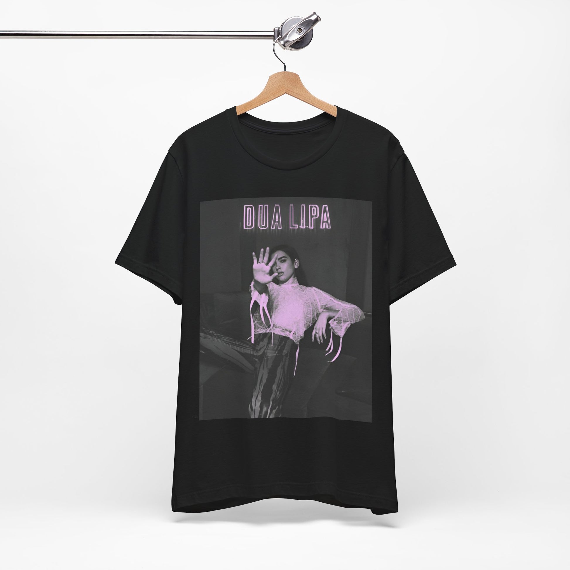 A black graphic t-shirt featuring a photo of Dua Lipa with a pink monochrome effect.