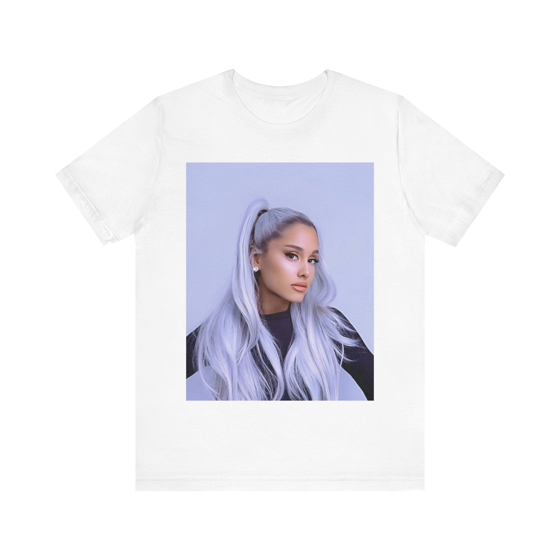 A black graphic t-shirt featuring a stylized graphic of Ariana Grande, possibly with a crown or 'Pop Queen' text, emphasizing her iconic status.