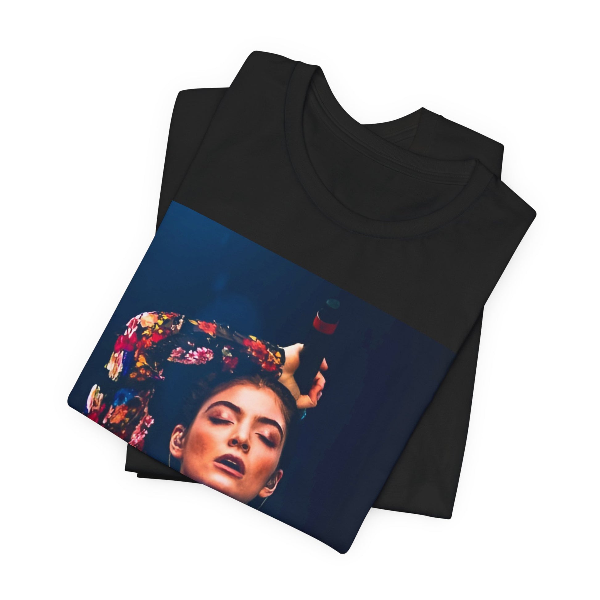 A black graphic t-shirt featuring a retro graphic related to Lorde's 'Pure Heroine' album era.