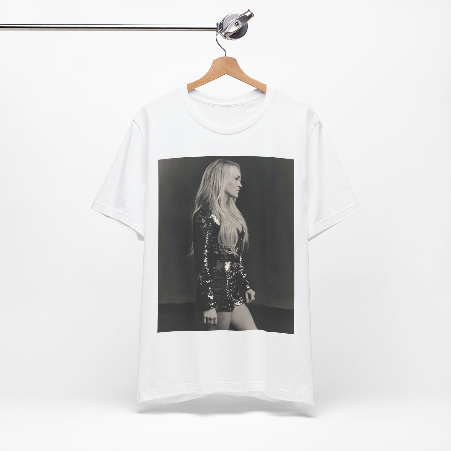 A black graphic t-shirt featuring a black and white photo of Carrie Underwood performing live on stage.
