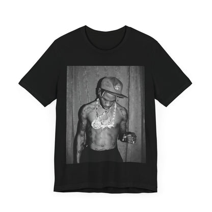 A black graphic t-shirt featuring a graphic of Travis Scott as the Houston rap king.