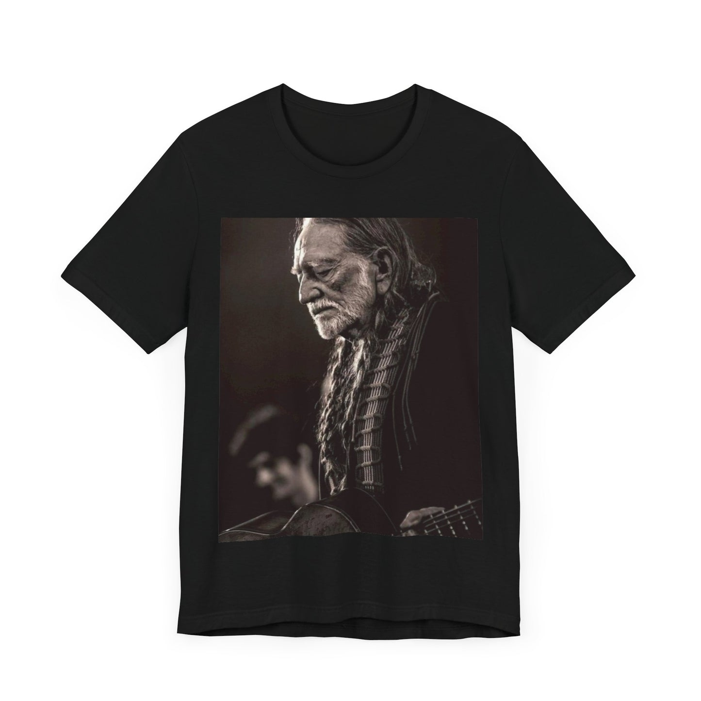 A black graphic t-shirt featuring a vintage country legend graphic of Willie Nelson.