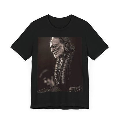 A black graphic t-shirt featuring a vintage country legend graphic of Willie Nelson.