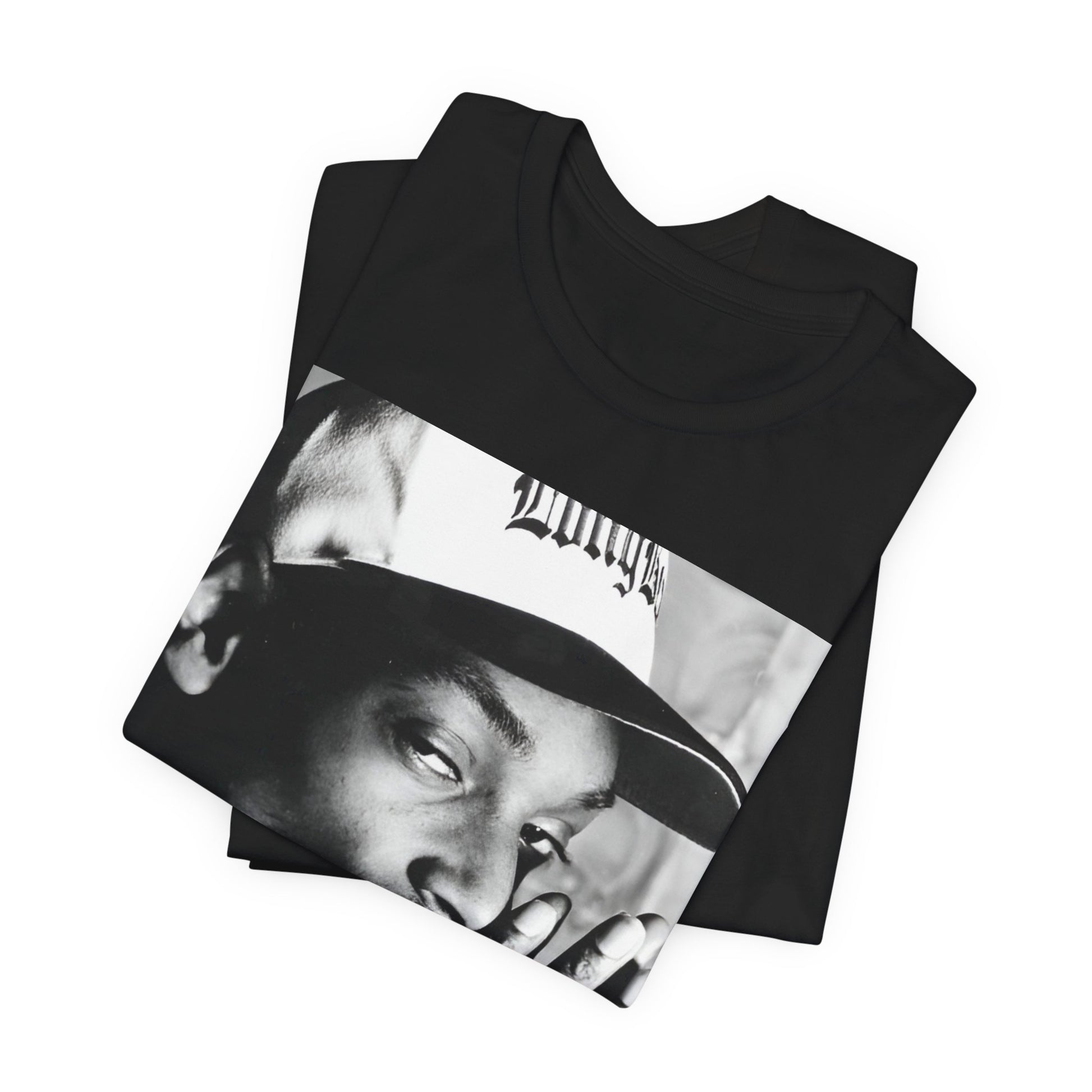 A black graphic t-shirt featuring a cool black and white graphic or photo of Snoop Dogg as a rapper.