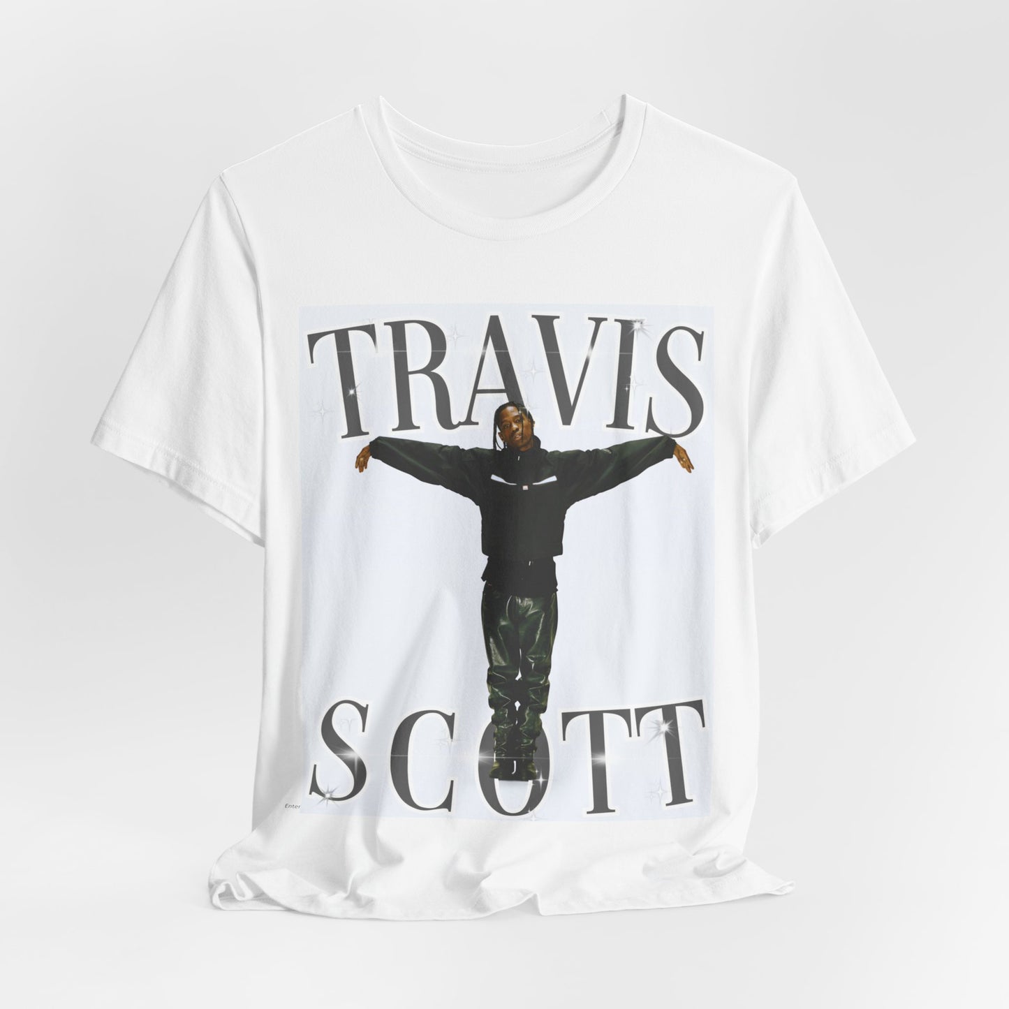 A black graphic t-shirt featuring a cool streetwear icon graphic of Travis Scott.
