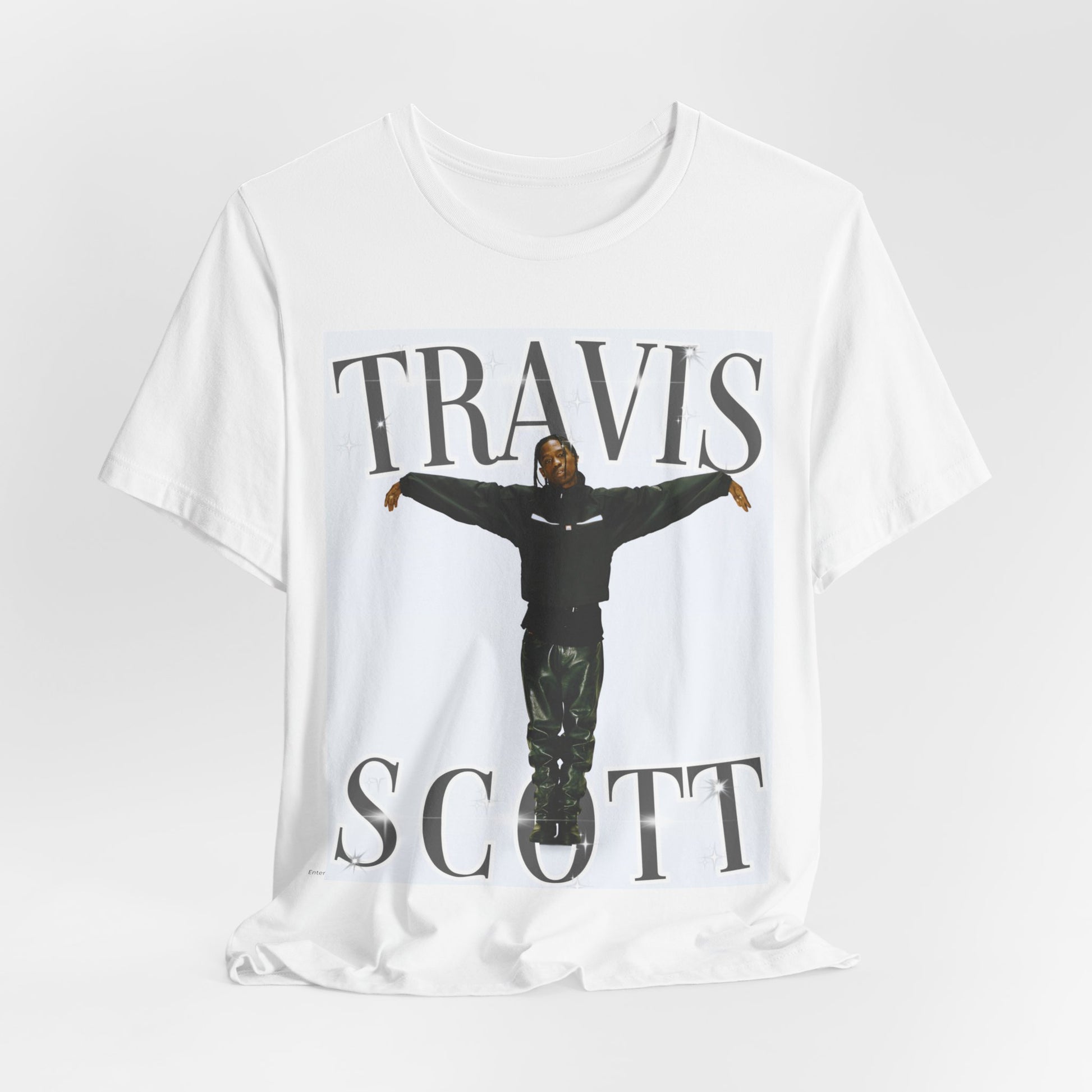 A black graphic t-shirt featuring a cool streetwear icon graphic of Travis Scott.