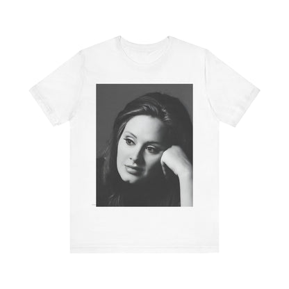 A black graphic t-shirt featuring a vintage-style black and white studio portrait of Adele, showing her with a poised and elegant expression.