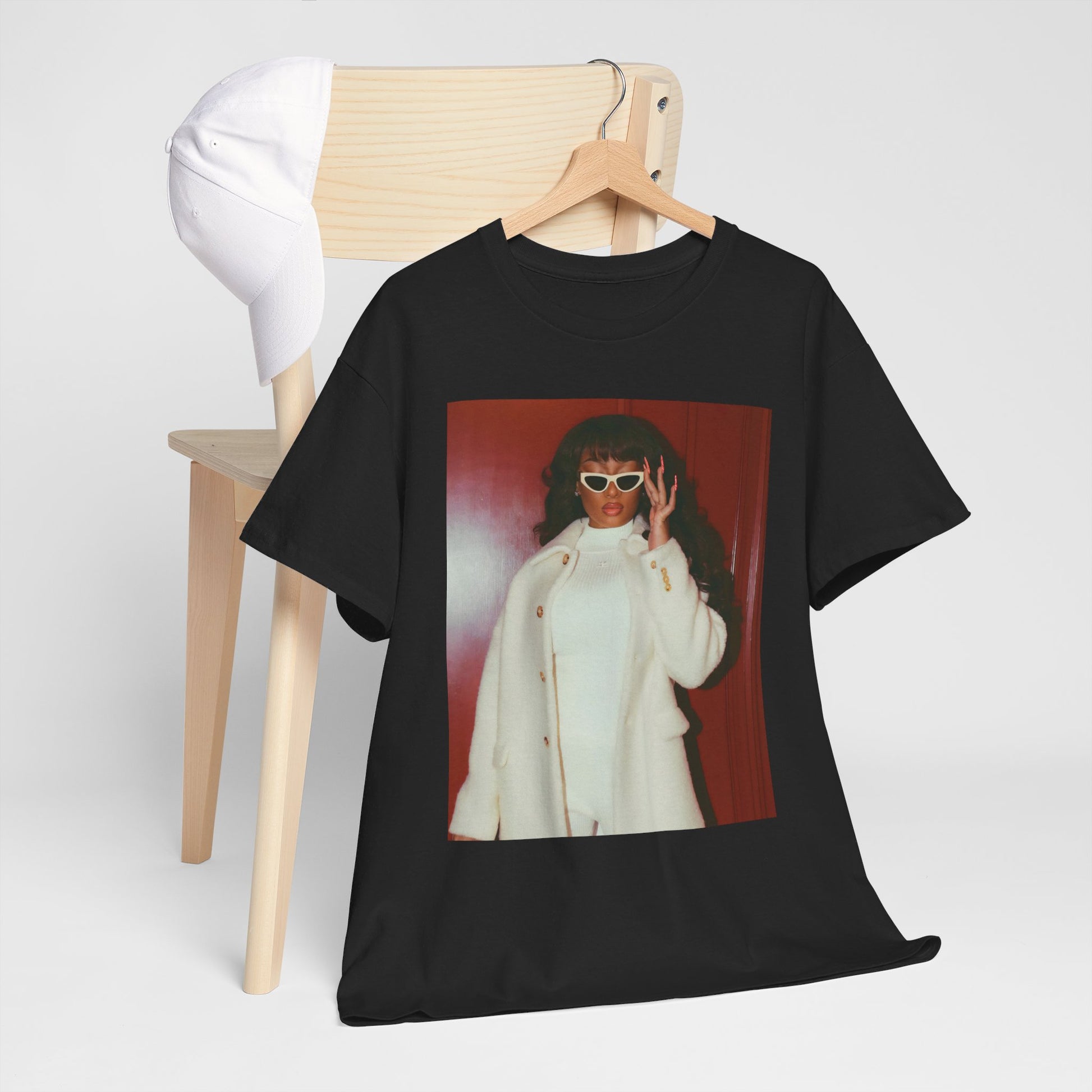 A black graphic t-shirt featuring a glamorous graphic of Megan Thee Stallion.