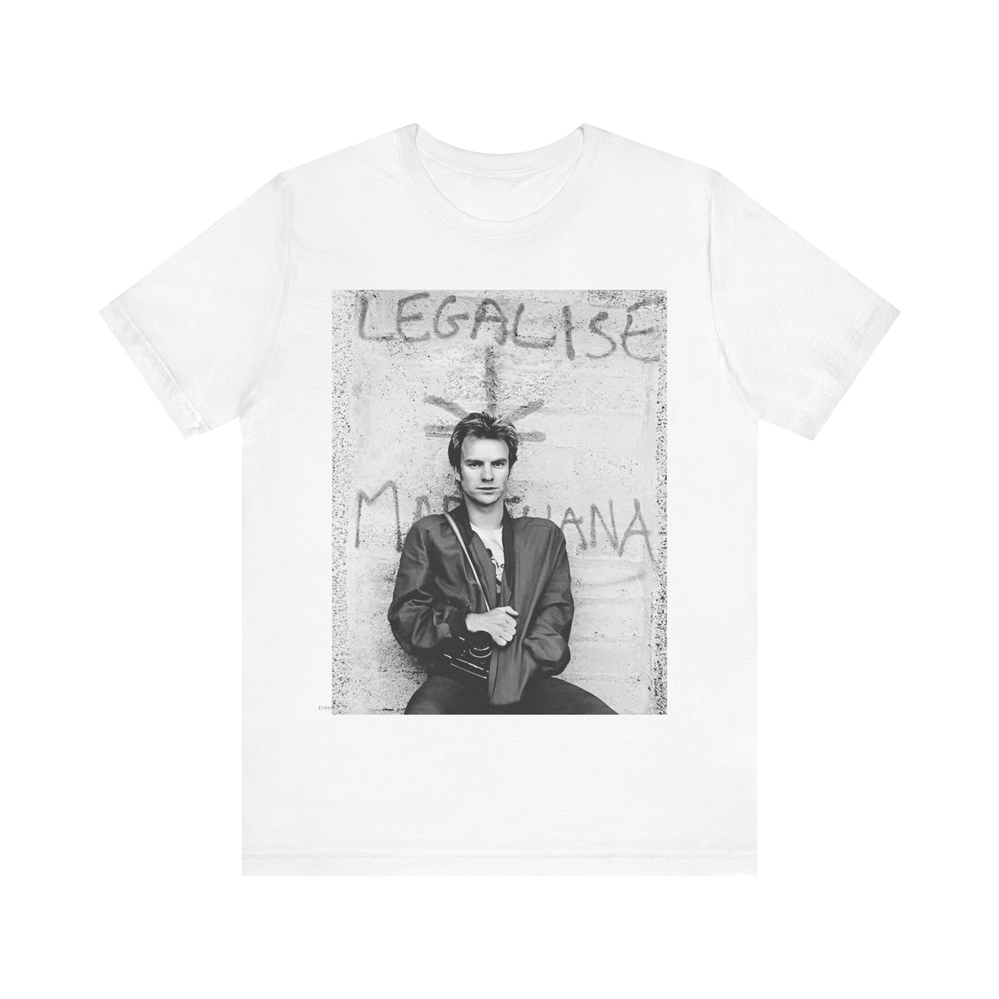 A black graphic t-shirt featuring a graphic of The Police with reggae-influenced pop elements.
