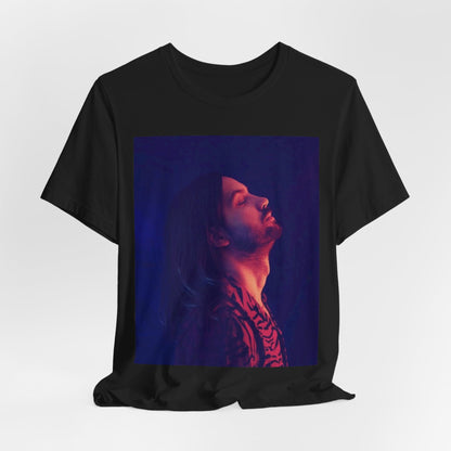 A black graphic t-shirt featuring a retro indie alt-rock graphic of Tame Impala.
