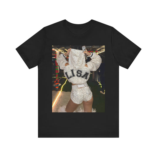 A black graphic t-shirt featuring a graphic or photo of Lisa in a backstage setting.