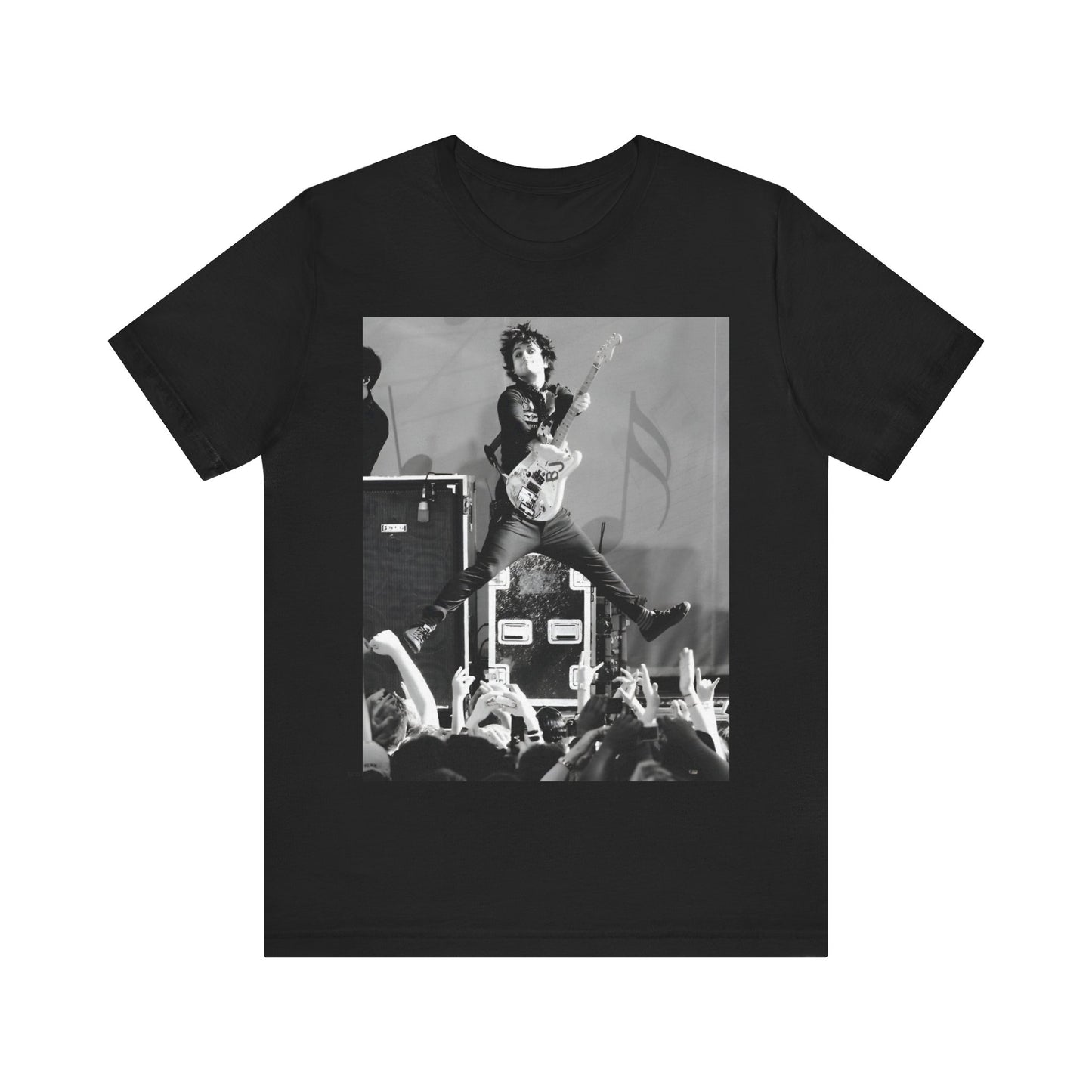 A black graphic t-shirt featuring a graphic of Billie Joe Armstrong from Green Day jumping on stage during a performance.